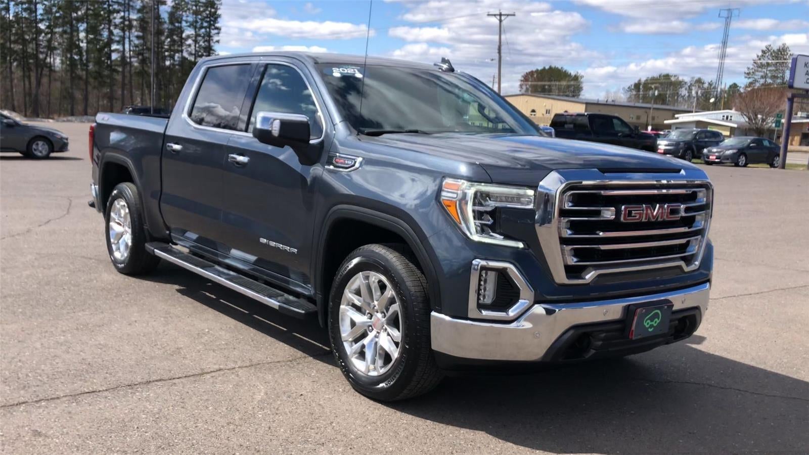 Used 2021 GMC Sierra 1500 SLT with VIN 1GTU9DEL7MZ281927 for sale in Hermantown, Minnesota